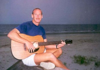 ''Strumming my six-string'' on the beach in Georgia.