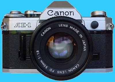 My first camera: a Canon AE-1, 35mm SLR.